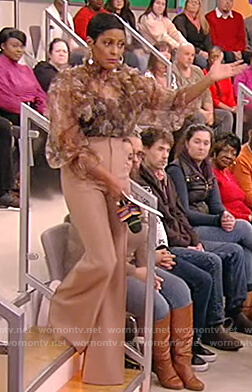 Tamron's beige flared pants on Tamron Hall Show