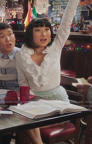 Mei's blue feather trim skirt on Sunnyside