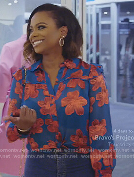 Kandi's blue floral blouse on The Real Housewives of Atlanta