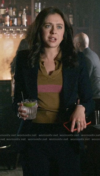Claire's mustard polo top with pink stripe on The Morning Show
