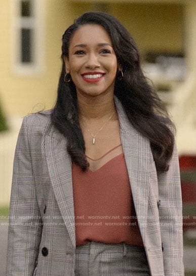 Iris's orange cami and plaid suit on Batwoman