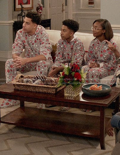 The Johnson Family's Christmas candy cane onesies on Black-ish