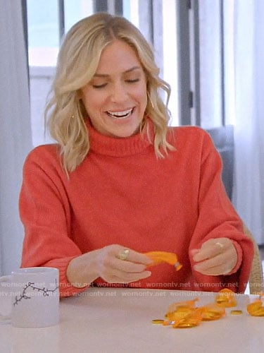 Kristin's orange cropped back turtleneck sweater on A Very Merry Cavallari