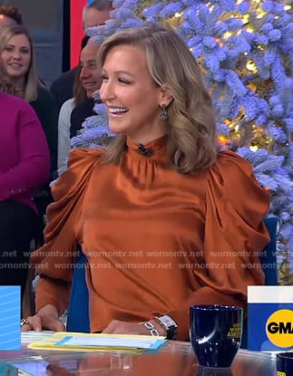 Lara's orange puff sleeve satin blouse on Good Morning America