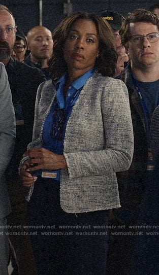 Mia's grey tweed jacket and blue blouse on The Morning Show