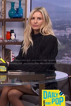 Morgan's black cable knit sweater and embellished mini skirt on E! News Daily Pop