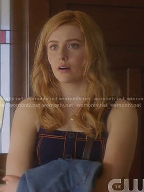 Nancy's navy sleeveless top and skirt with orange stitching on Nancy Drew