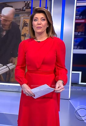 Norah's red dress with scarf on CBS Evening News