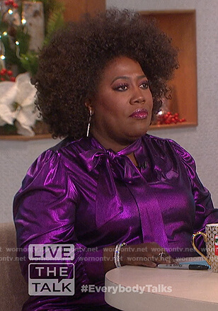 Sheryl's purple metallic blouse on The Talk