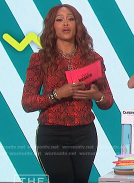 Eve's red snakeskin sweatshirt on The Talk