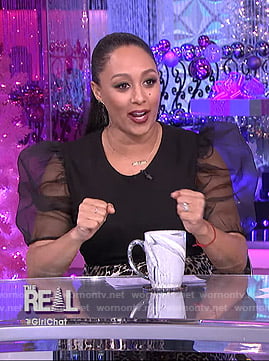Tamera's black puff sleeve top and leopard print skirt on The Real