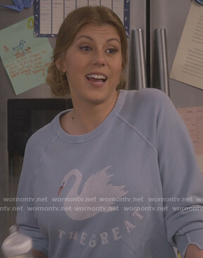 Stephanie's blue swan sweatshirt on Fuller House