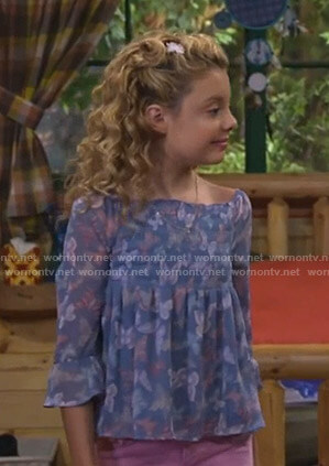 Destiny's blue butterfly print smocked top on Bunkd