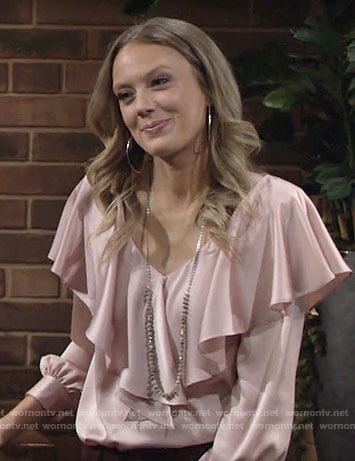 Abby's pink ruffle overlay blouse on The Young and the Restless