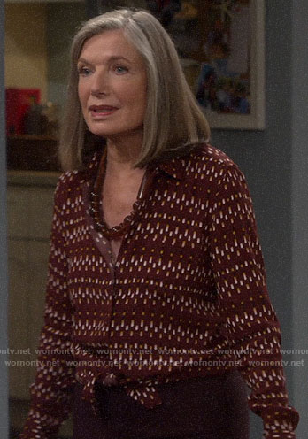 Bonnie's red printed button down blouse on Last Man Standing