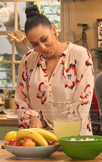 Cocoa's blush floral blouse on Family Reunion