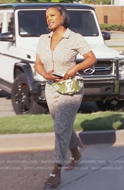 Kandi's leaf print jumpsuit and belt bag on The Real Housewives of Atlanta