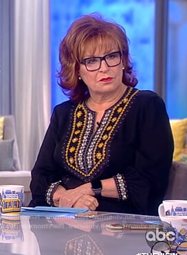 Joy's black embellished trim blouse on The View
