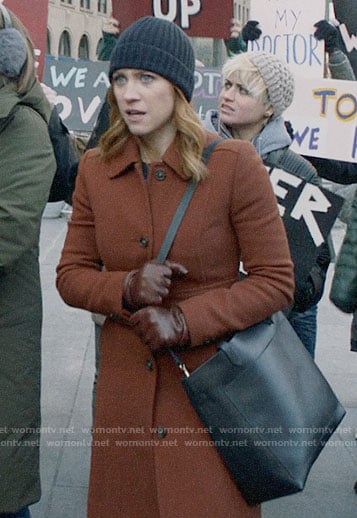 Julia's rust brown coat on Almost Family