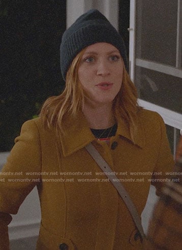 Julia's mustard yellow coat on Almost Family
