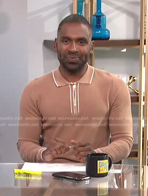 Justin's camel knit polo on E! News Daily Pop