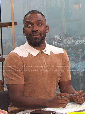 Justin's brown and white short sleeve sweater on E! News Daily Pop
