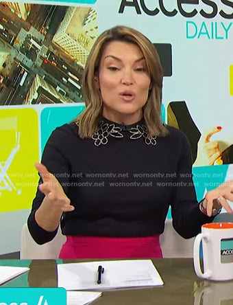 Kit's black sweater with beaded floral collar on Access Hollywood
