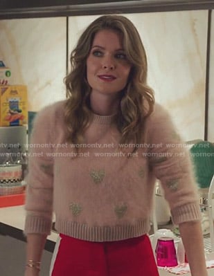 Sutton's pink heart print sweater on The Bold Type