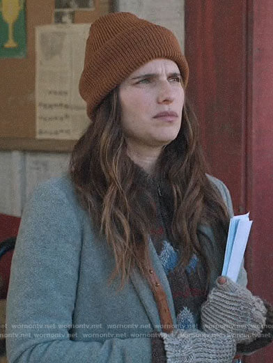 Rio's brown printed zip sweater on Bless This Mess