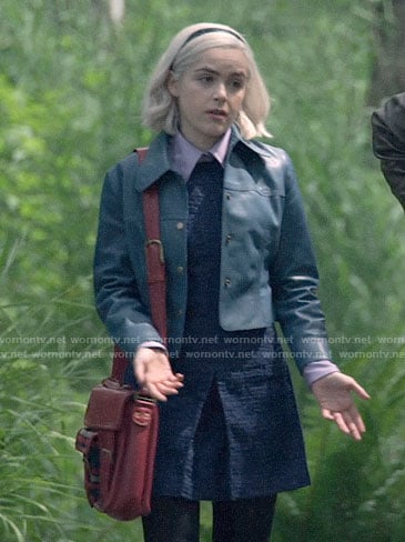 Sabrina's navy tweed dress and blue leather jacket on Chilling Adventures of Sabrina