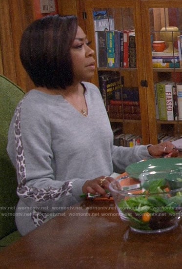 Tina's grey sweatshirt with leopard stripe on The Neighborhood