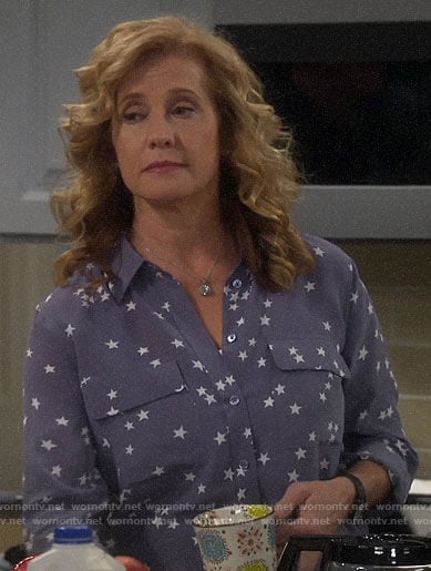 Vanessa's blue star print blouse on Last Man Standing