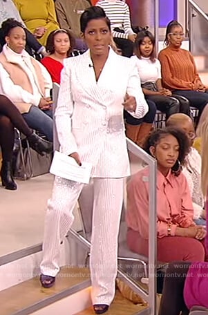 Tamron's white pinstripe blazer and pants on Tamron Hall Show