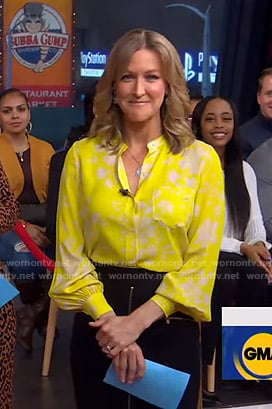 Lara's yellow floral blouse and zip front skirt on Good Morning America