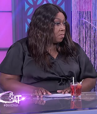 Loni's black satin wrap jumpsuit on The Real