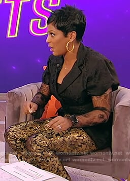 Tamron's black jacquard pants on Tamron Hall Show