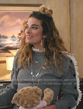 Alexis's grey button sleeve sweater with ruffle lace trim on Schitts Creek