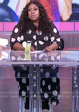 Loni's black polka dot jumpsuit on The Real