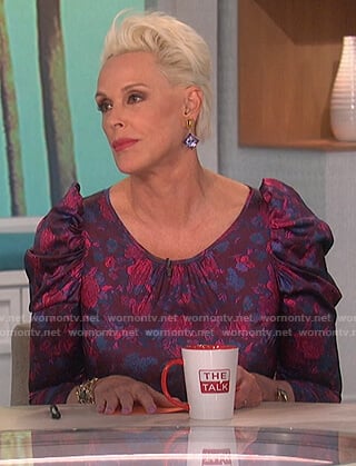 Brigitte Nielsen's purple floral mini dress on The Talk