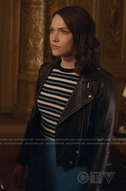 Cara's striped sweater, turquoise skirt and leather jacket on God Friended Me