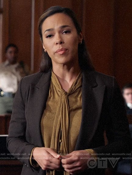 Emily's gold tie neck blouse on All Rise