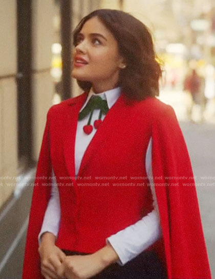 Katy's white top with velvet cherries and red cape on Katy Keene