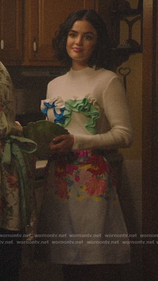 Katy's ruffled front sweater and floral apron on Katy Keene