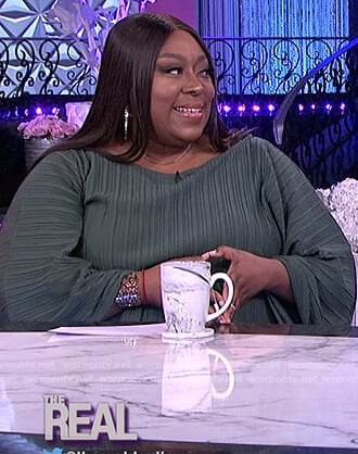 Loni's green ribbed drape dress on The Real