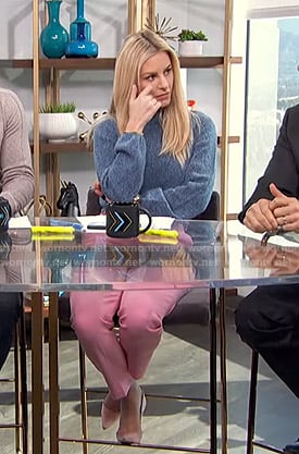 Morgan's blue sweater and pink trousers on E! News Daily Pop