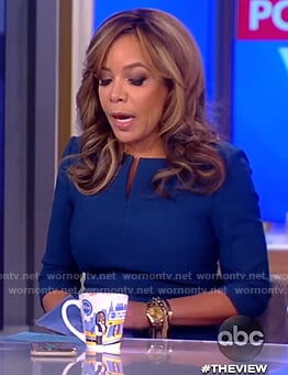 Sunny's navy split neck sheath dress on The View
