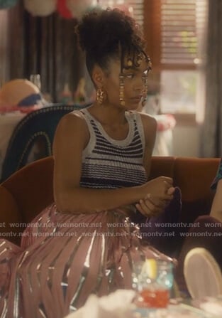 Zoey's black stripe crop top and metallic skirt on Grown-ish