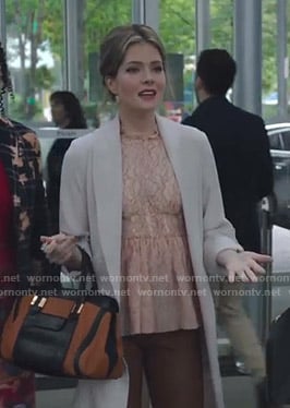 Sutton's pink lace peplum top on The Bold Type