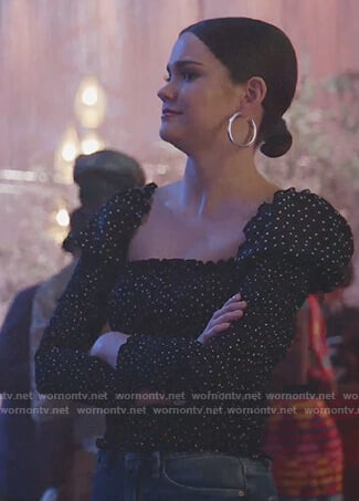 Callie's black polka dot smocked top on Good Trouble