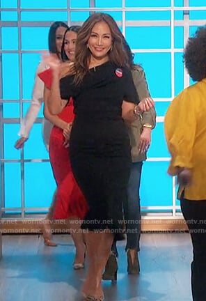 Carrie's black one off shoulder dress on The Talk